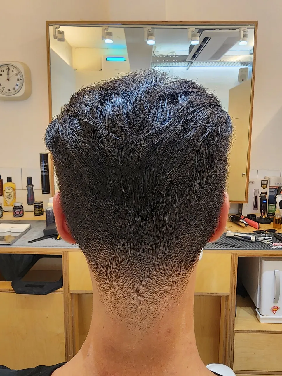 After shot of men's hair following cut and shampoo