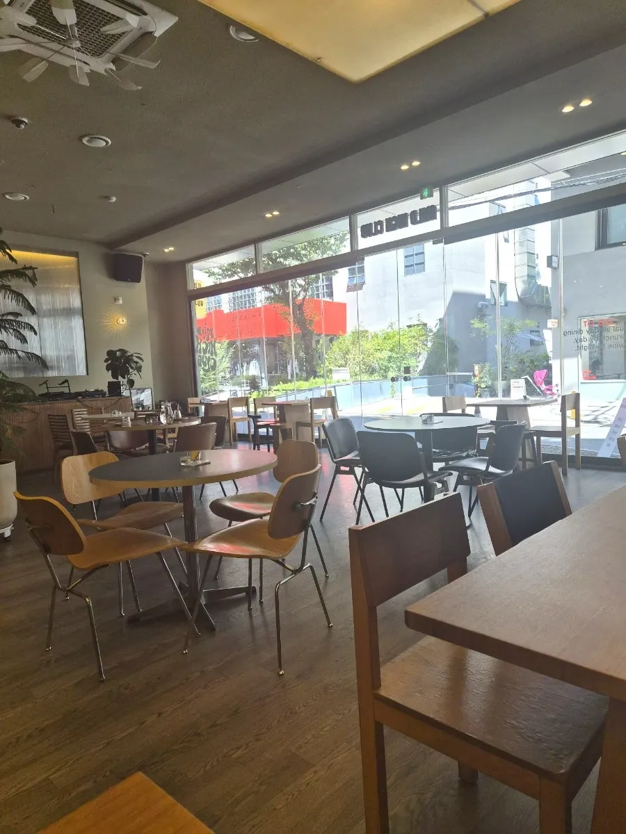 Tables generously spaced in the brunch café