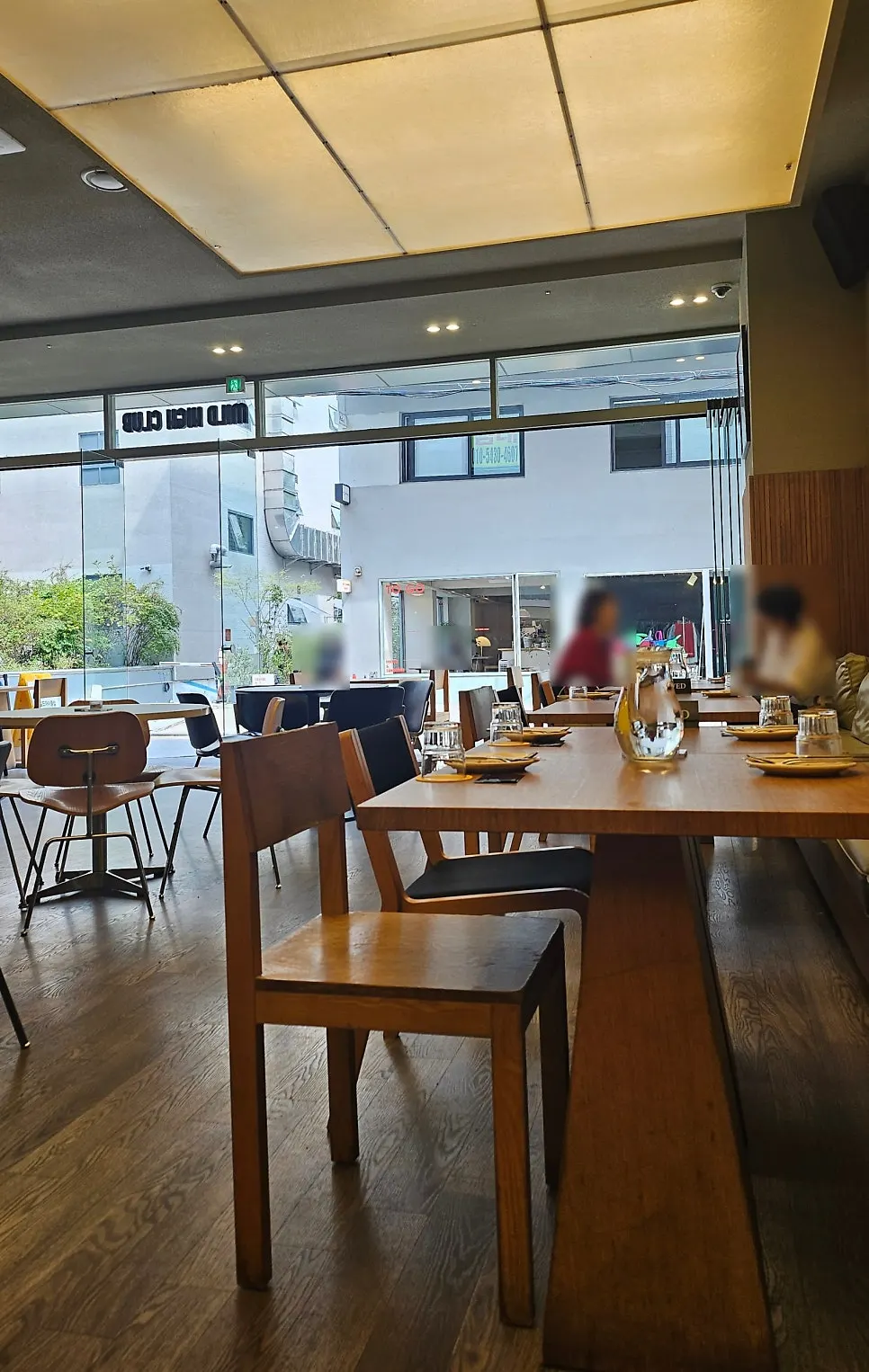 Interior of the open-plan brunch spot with doors left open
