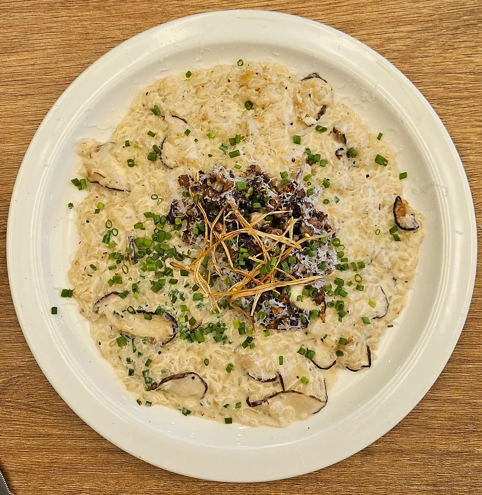Steaming hot beef risotto served fresh