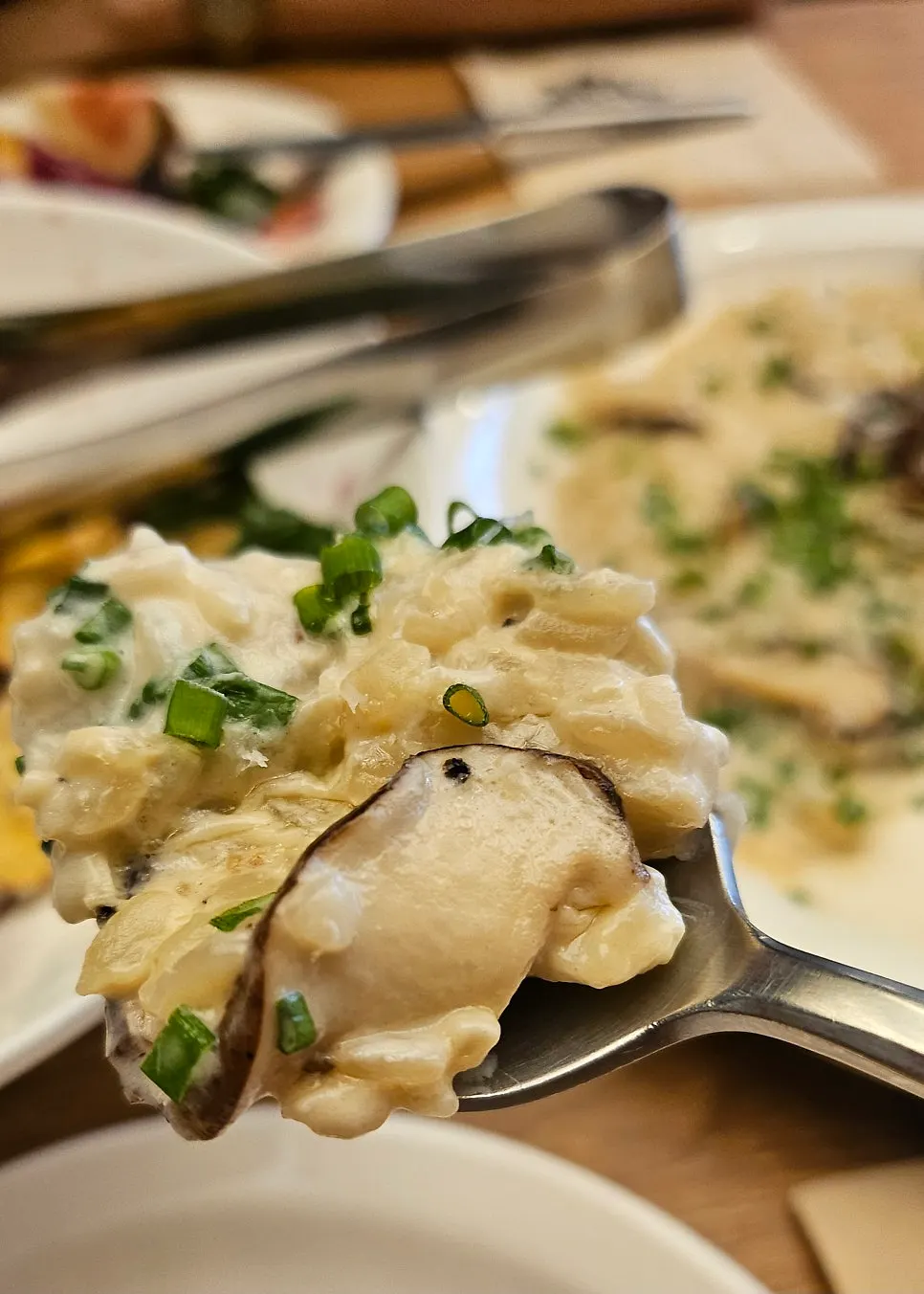 Creamy risotto topped with pieces of beef