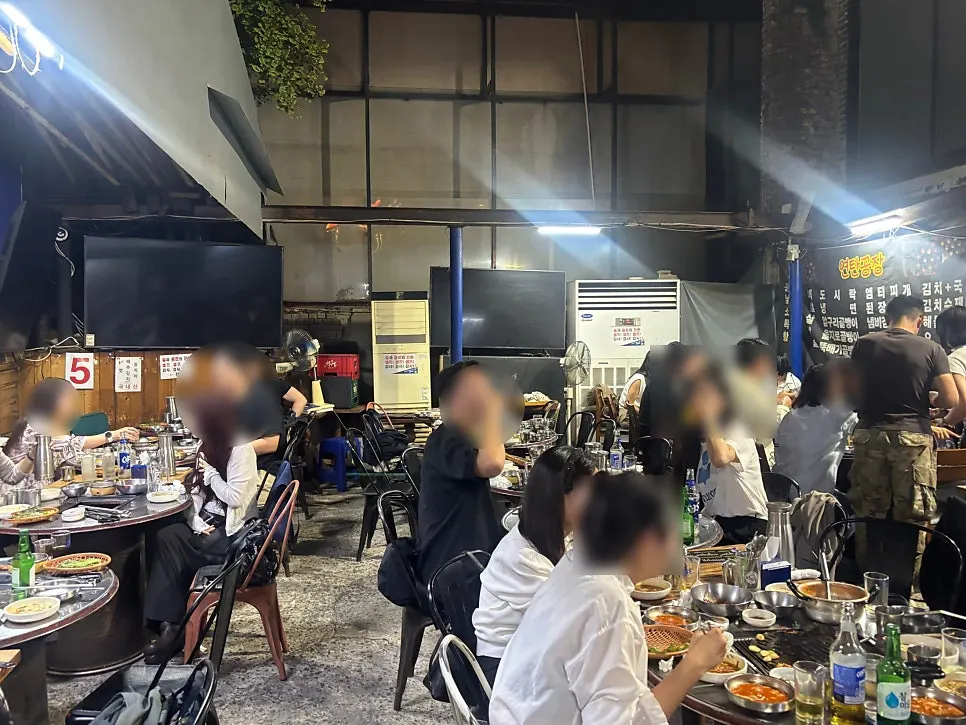 Retro-style outdoor Korean BBQ dining space