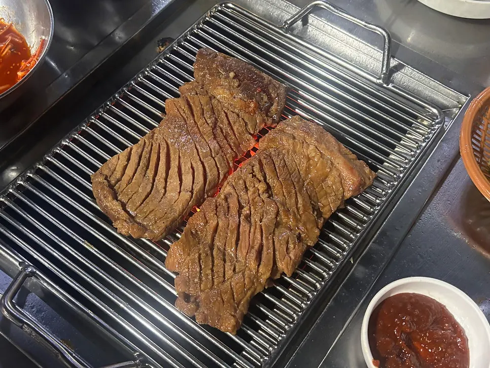 Thick king-size ribs grilling