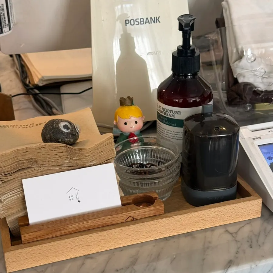 Menu and call bell placed on the table