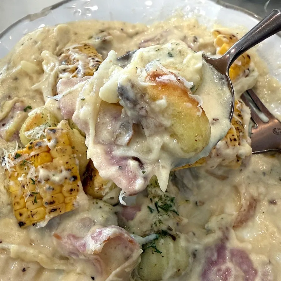 Corn gnocchi placed under the floor-to-ceiling window light