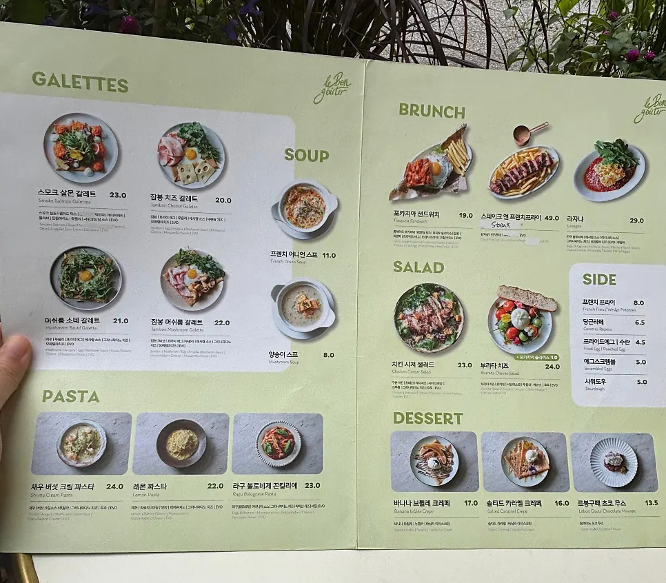 Menu board showing galette and pasta options at Le Bon Goûter