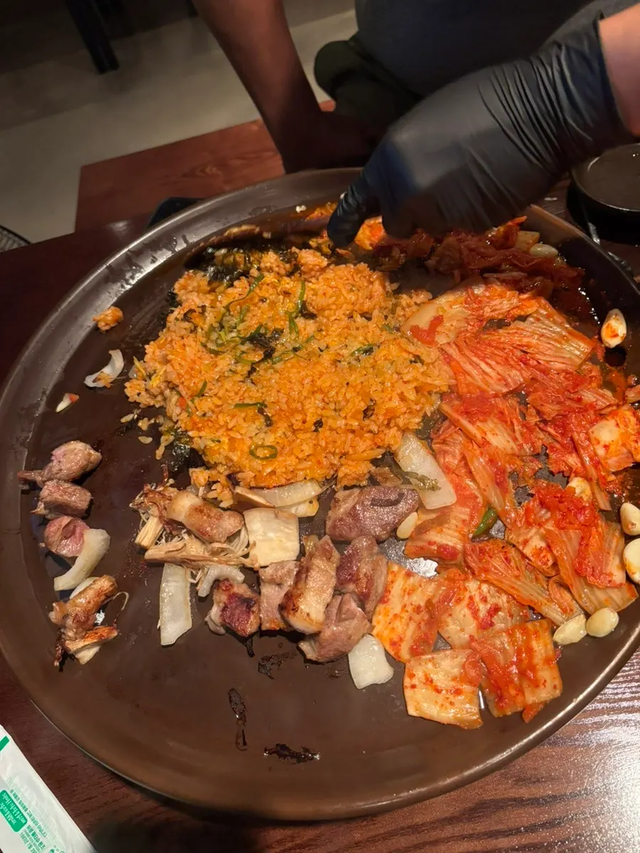 Kimchi fried rice cooking on the grill