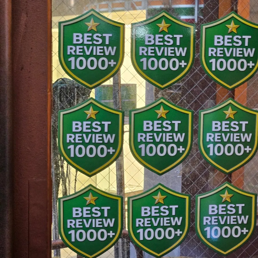 Entrance with a sticker marking over 1,000 best reviews
