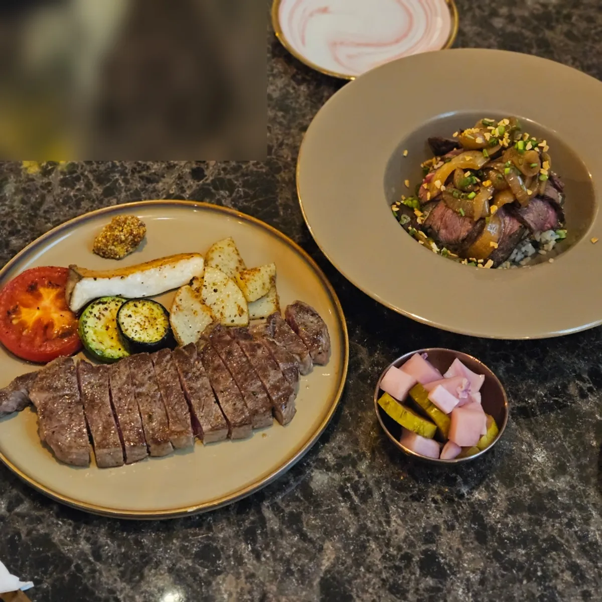A meal laid out on the table at Awesome Rose