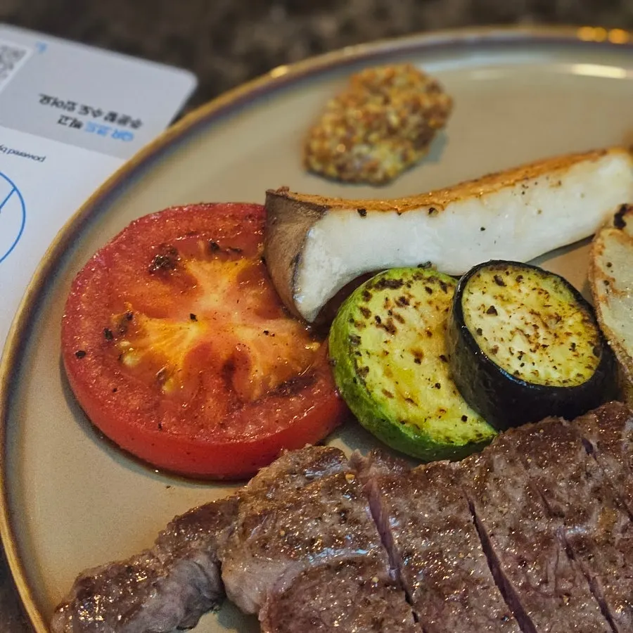 Cross-section of a 250g Hanwoo steak cooked medium-well