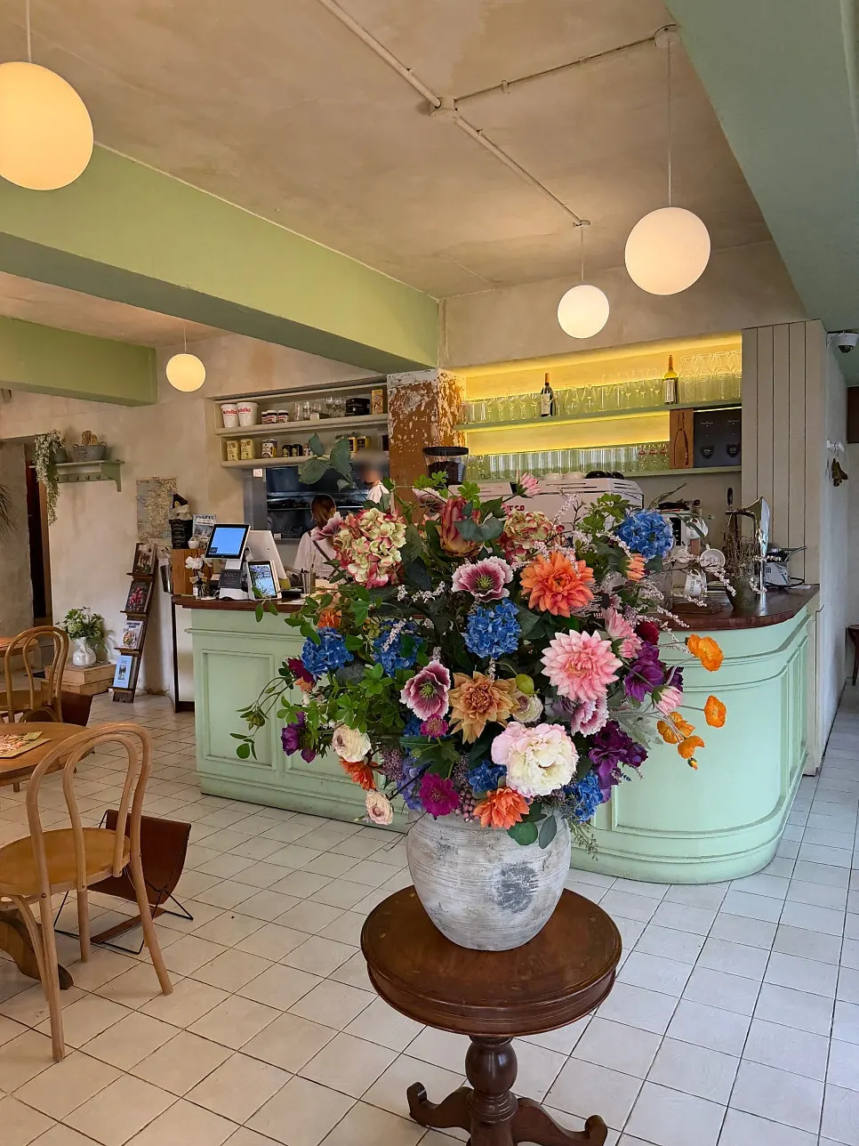 Wooden furniture and seating at Le Bon Goûter