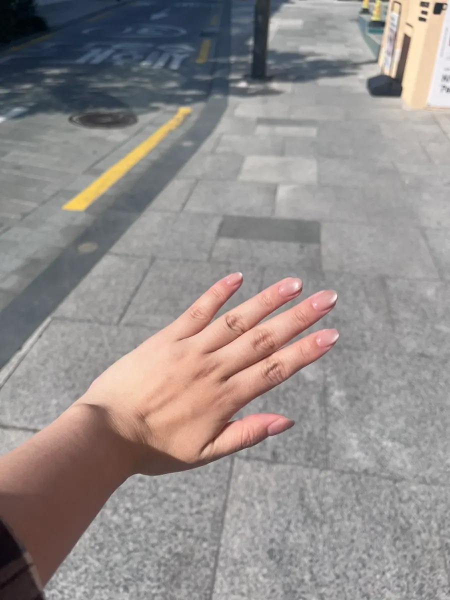 Feminine pink magnetic nail design