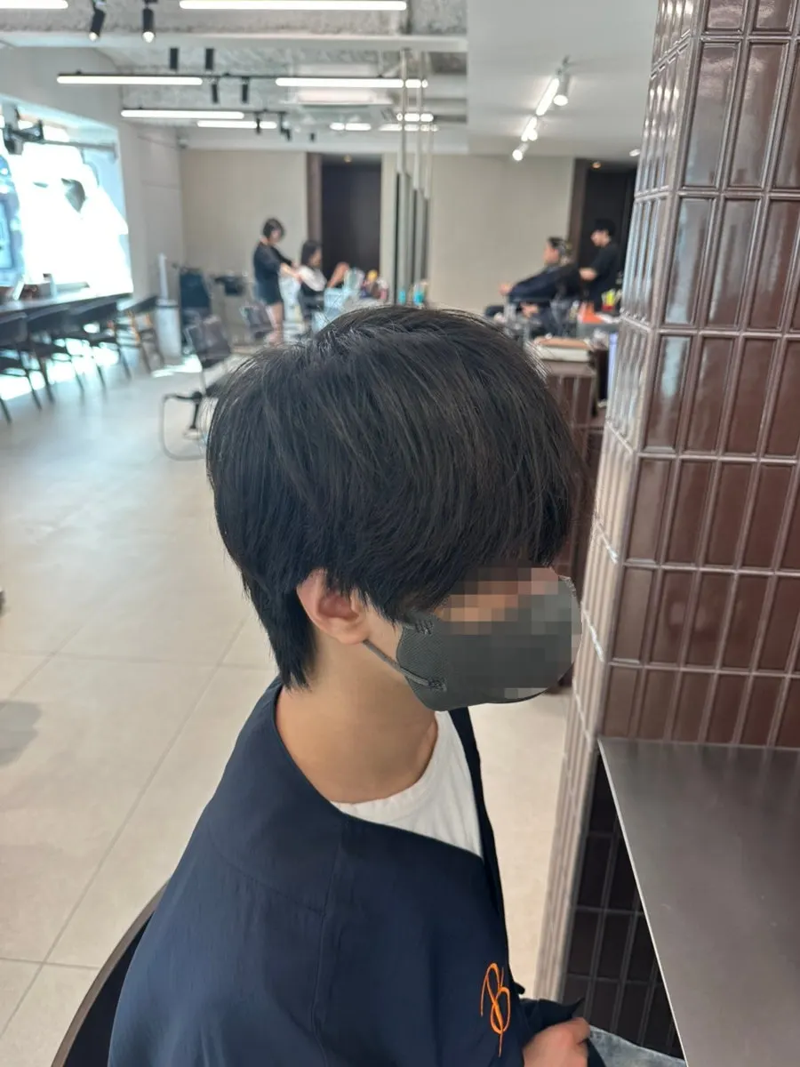 남자 펌 시술을 담당한 수석디자이너