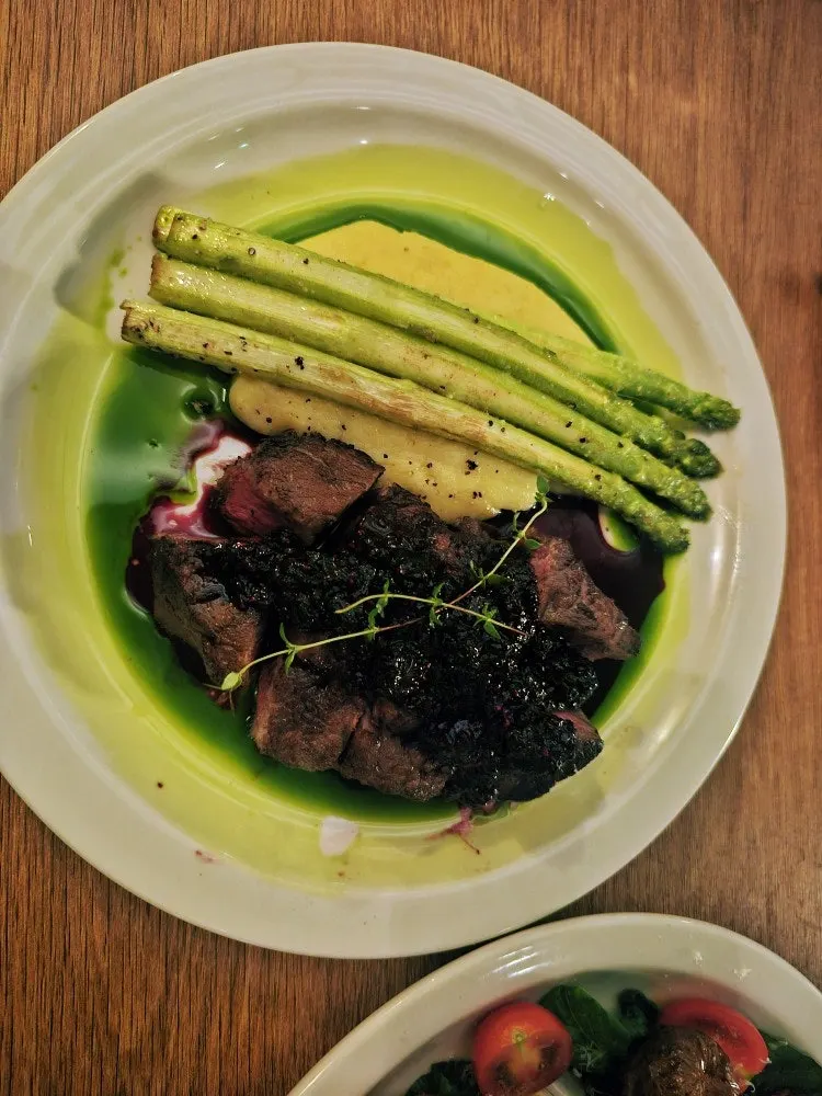 Flat iron steak and sides at Mild High Club