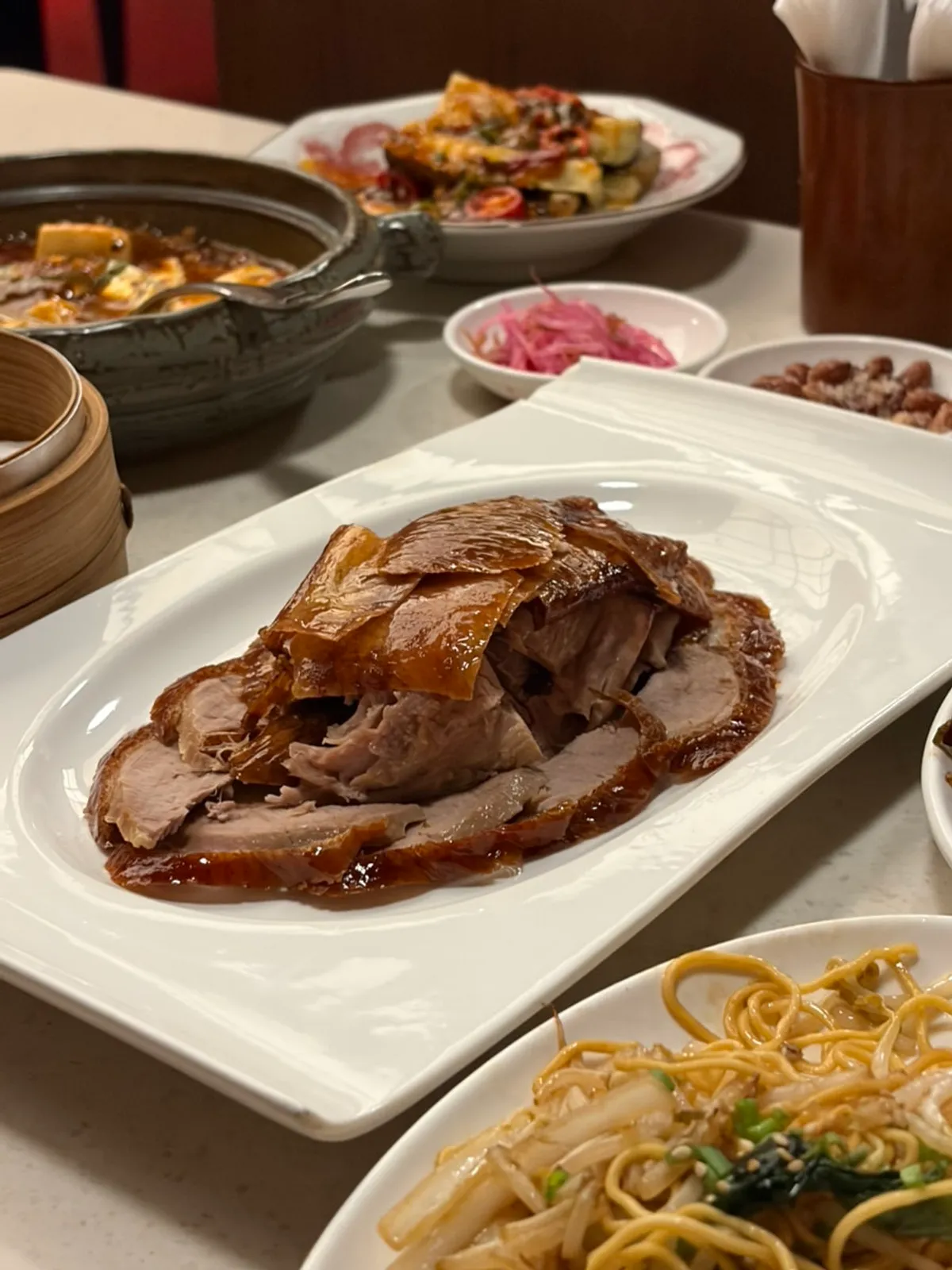 Table spread with half Peking duck at Mirim Yangjang Apgujeong