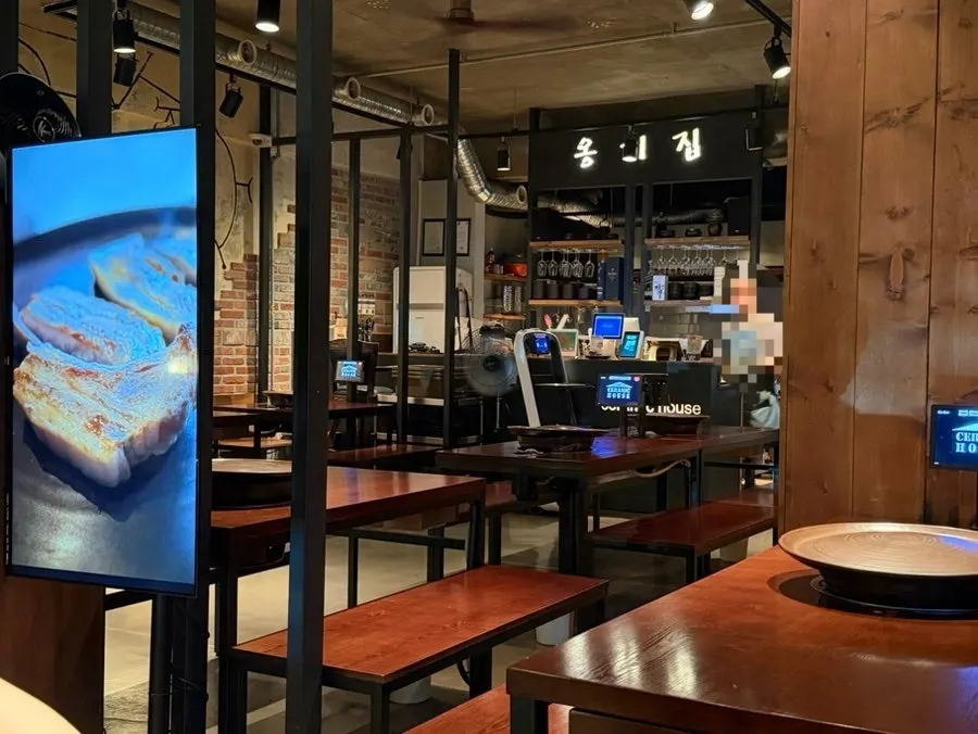 Korean BBQ restaurant interior with an outdoor-dining feel