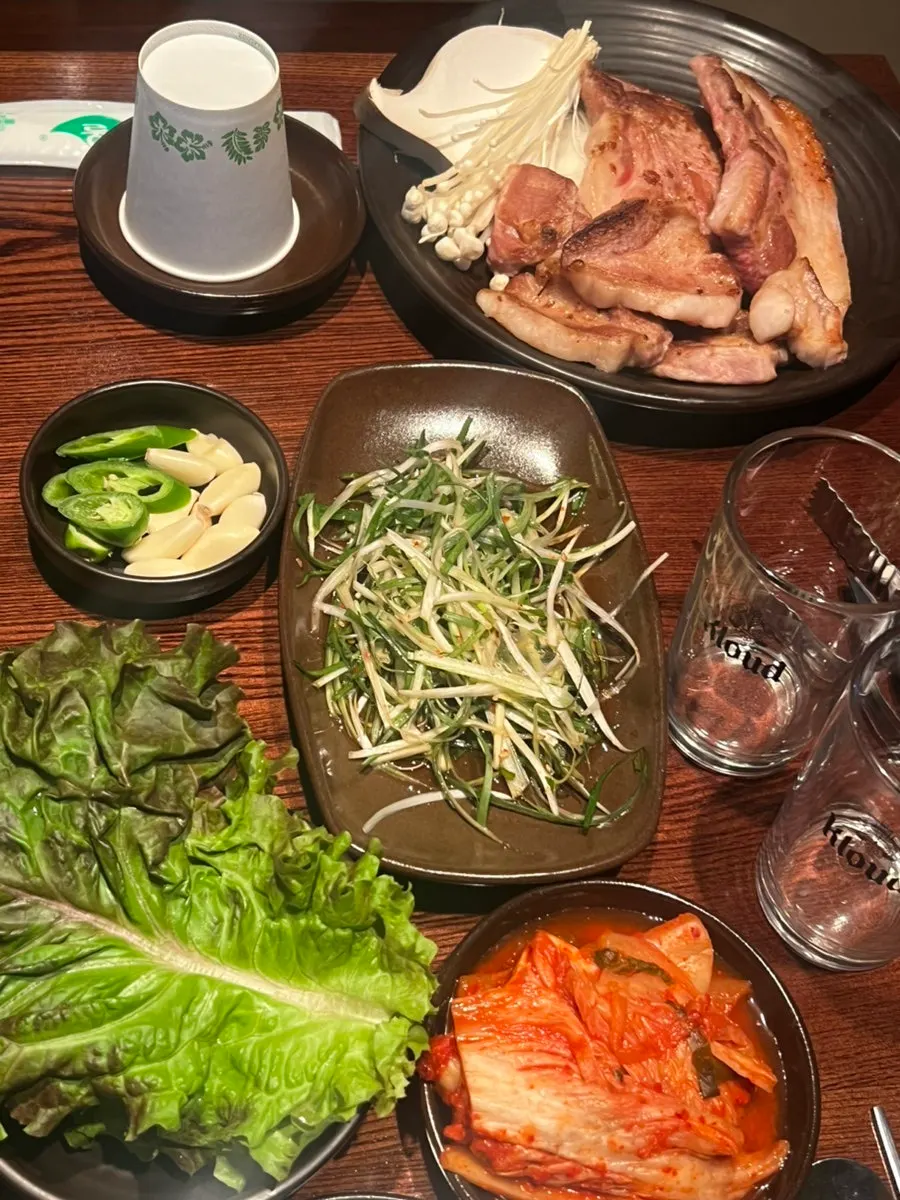 Pre-grilled pork finished by a staff member