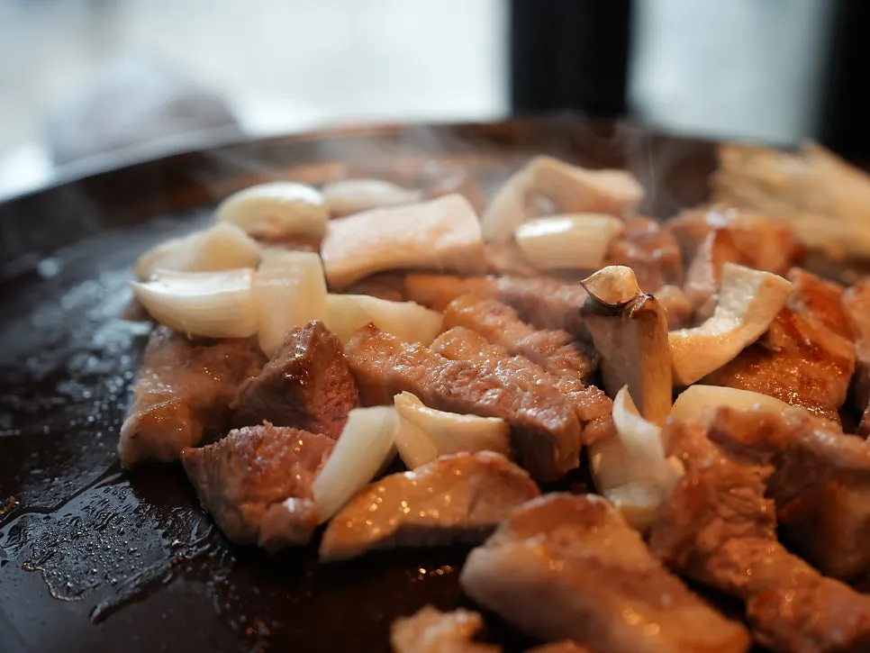 Perfectly cooked pork belly served with salt