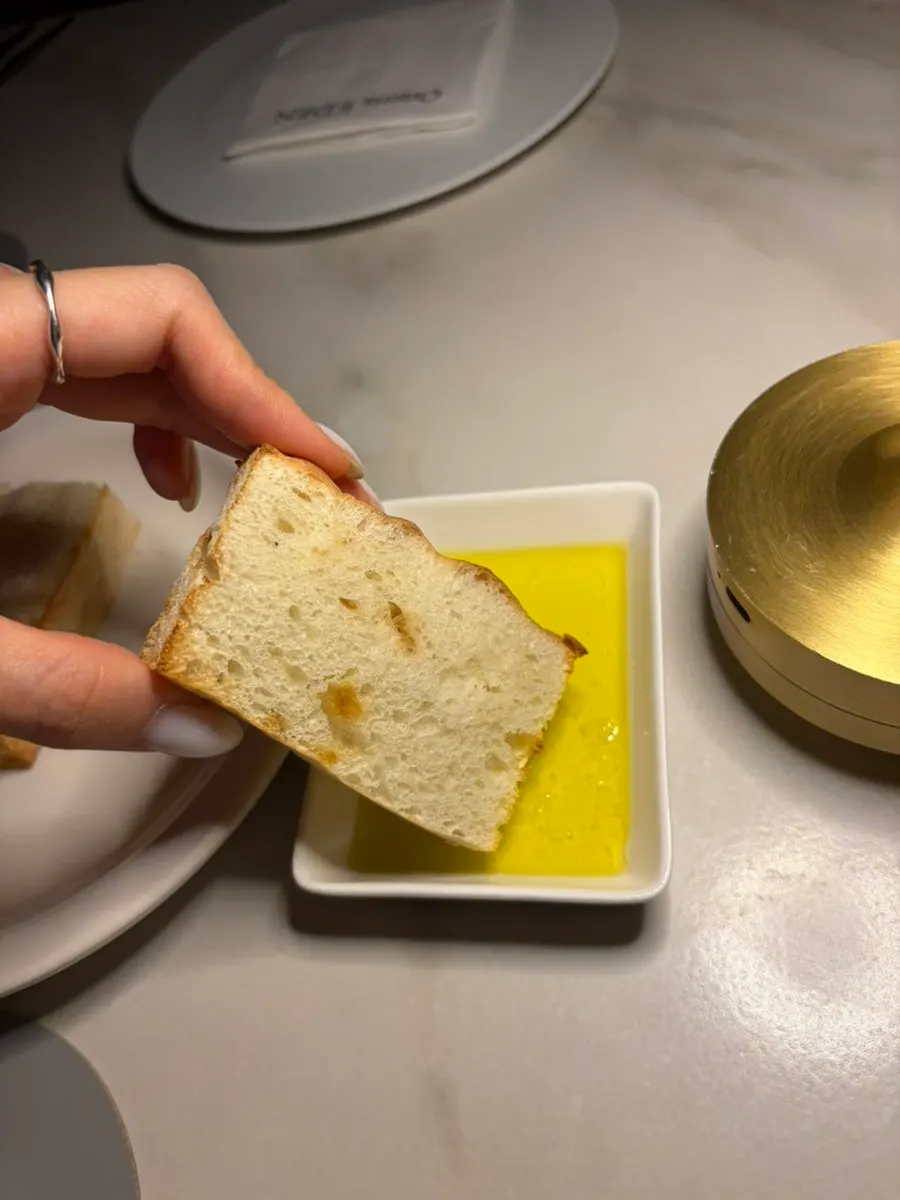 Plate of olive oil sprinkled with salt