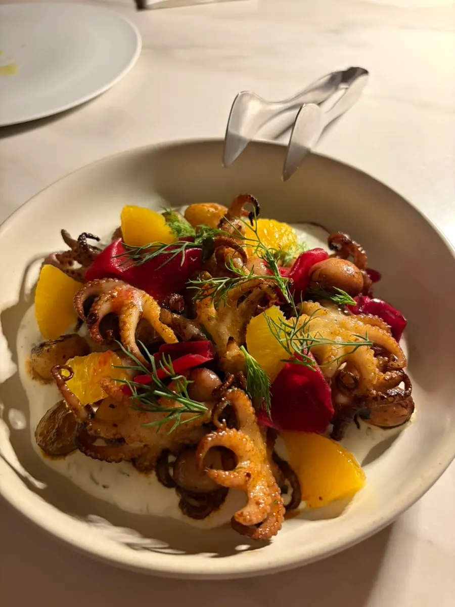 Colorful plating of the octopus potato dish