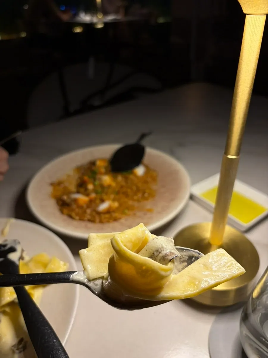 Truffle pasta twirled around a fork