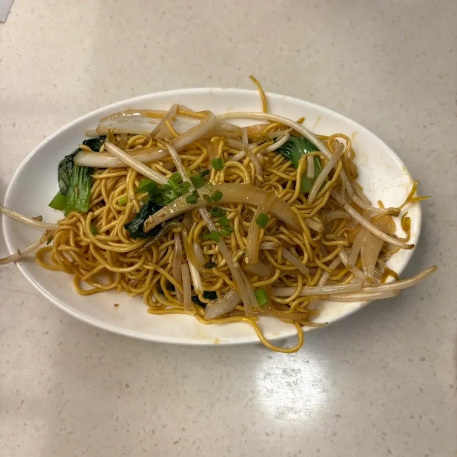 Hong Kong-style egg noodles served with Peking duck
