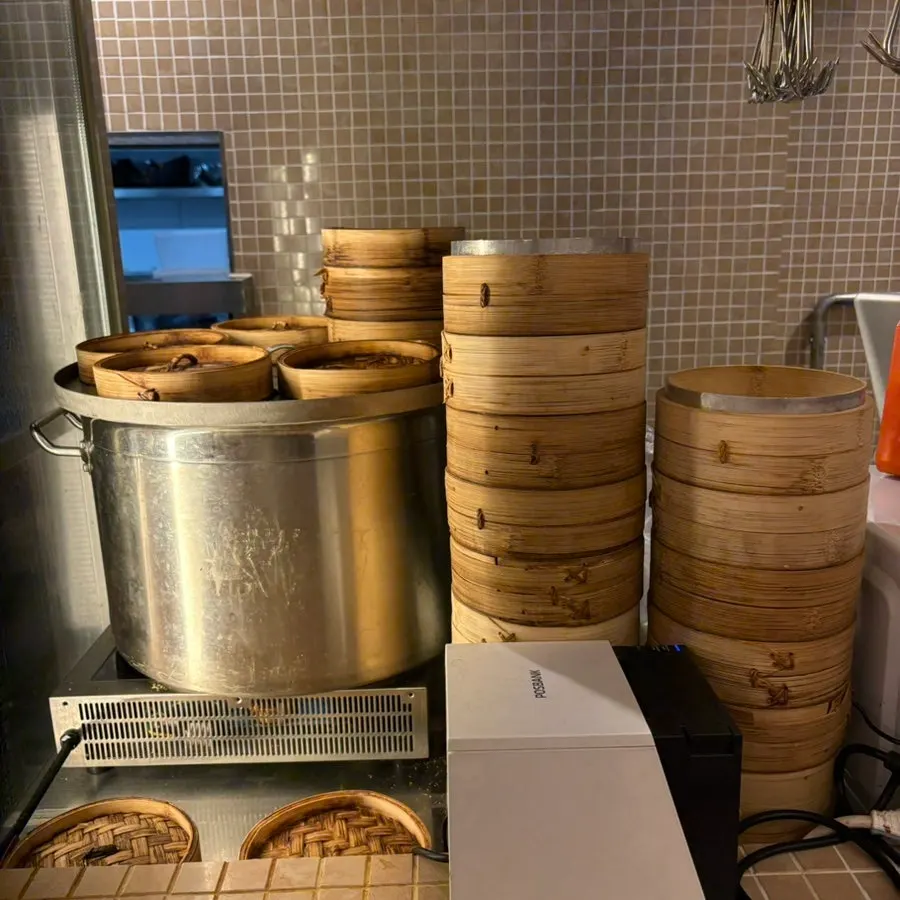 A menu offering Peking duck from a half portion