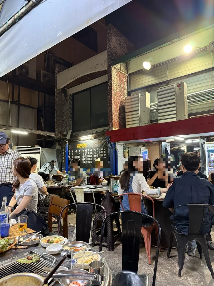 Open-air seating area spread out between two buildings