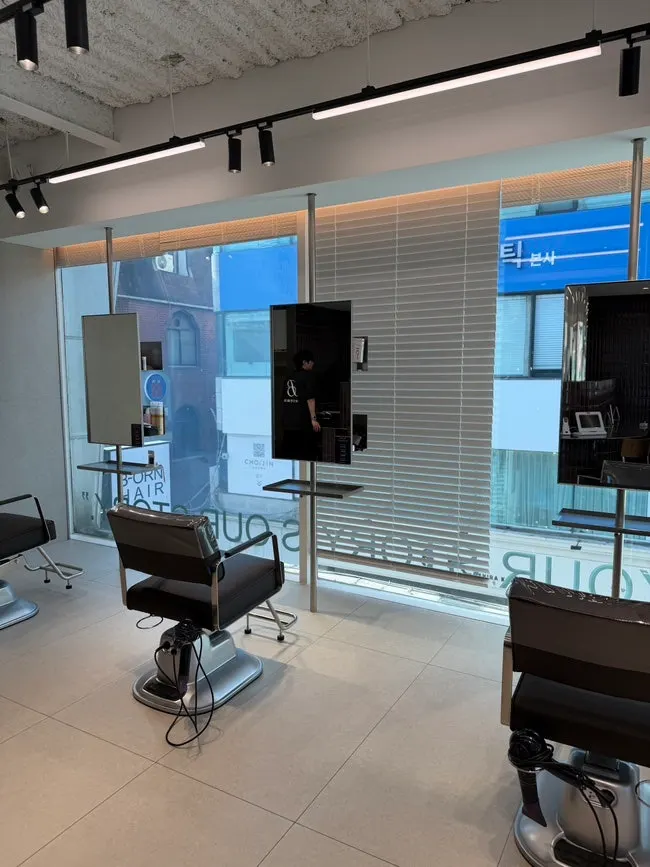 Interior of Biorn Hair with floor-to-ceiling windows