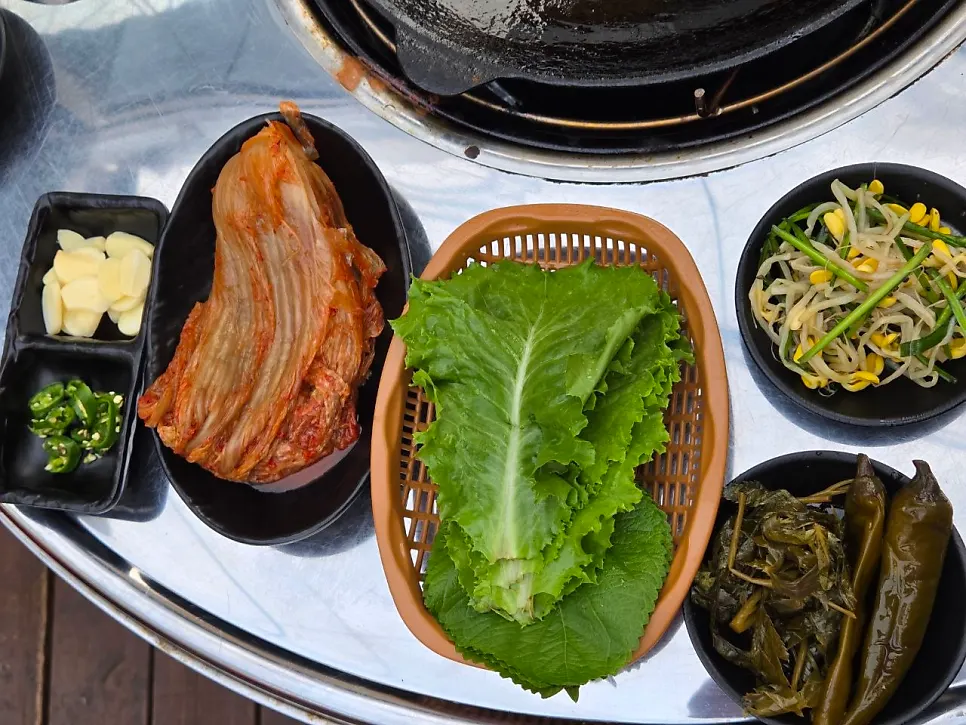 Table setting with ssamjang and side toppings
