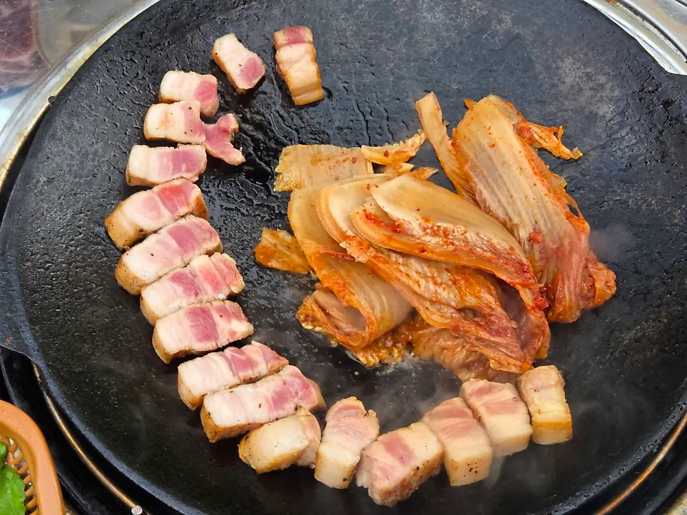 Full table shot of the Maillard 100-point pre-seared pork belly spread