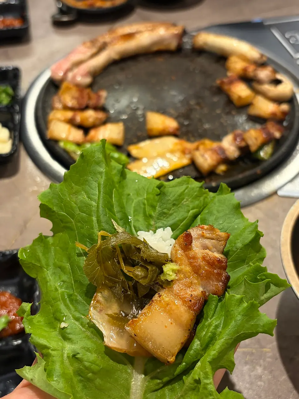 Bone pork belly eaten with pickled Korean angelica