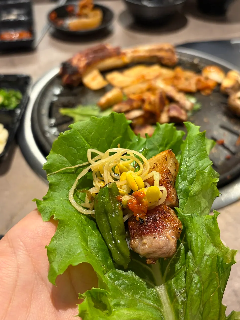 A juicy bite of bone pork belly