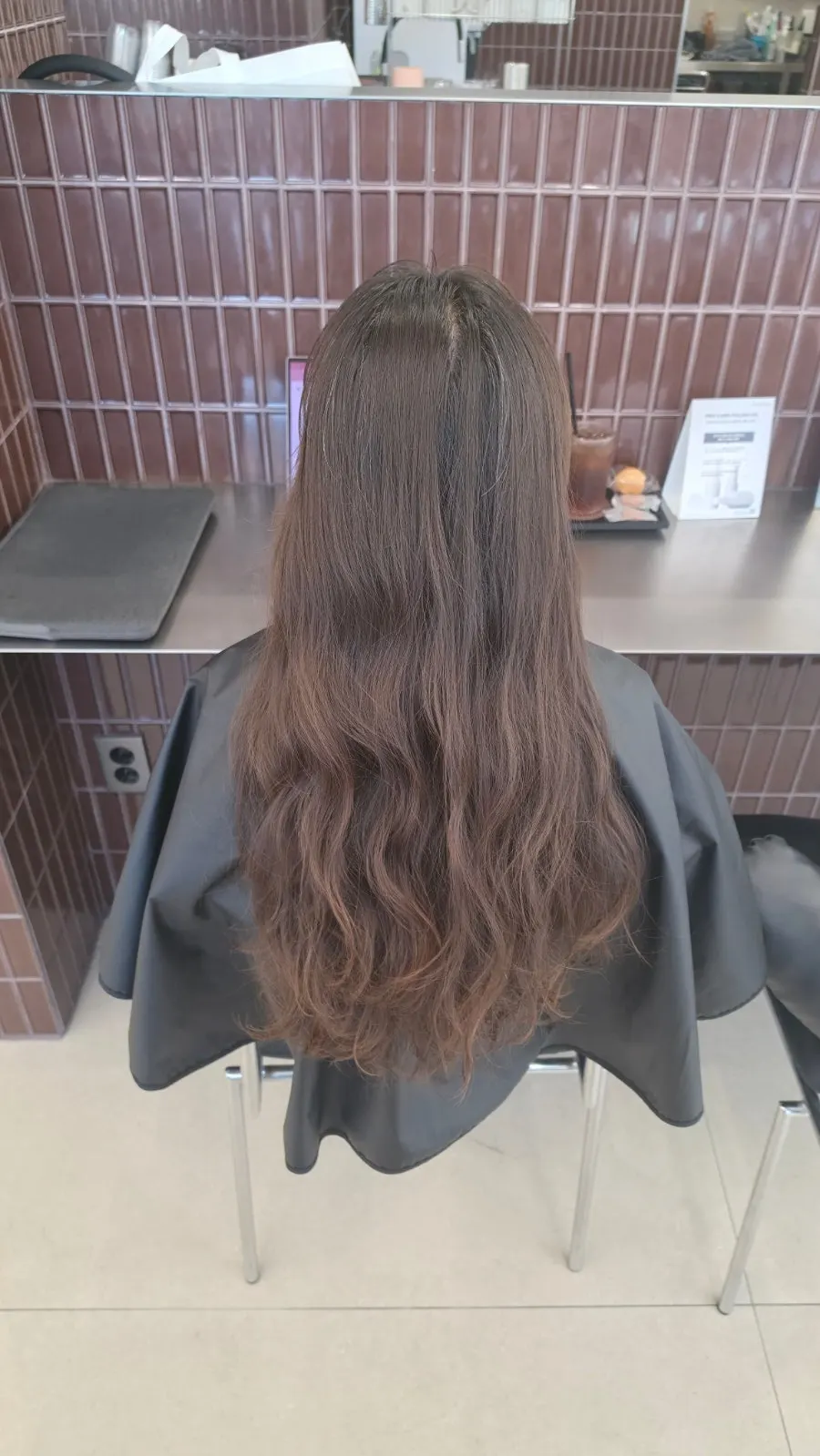 Finished full-head dye in an even brown tone