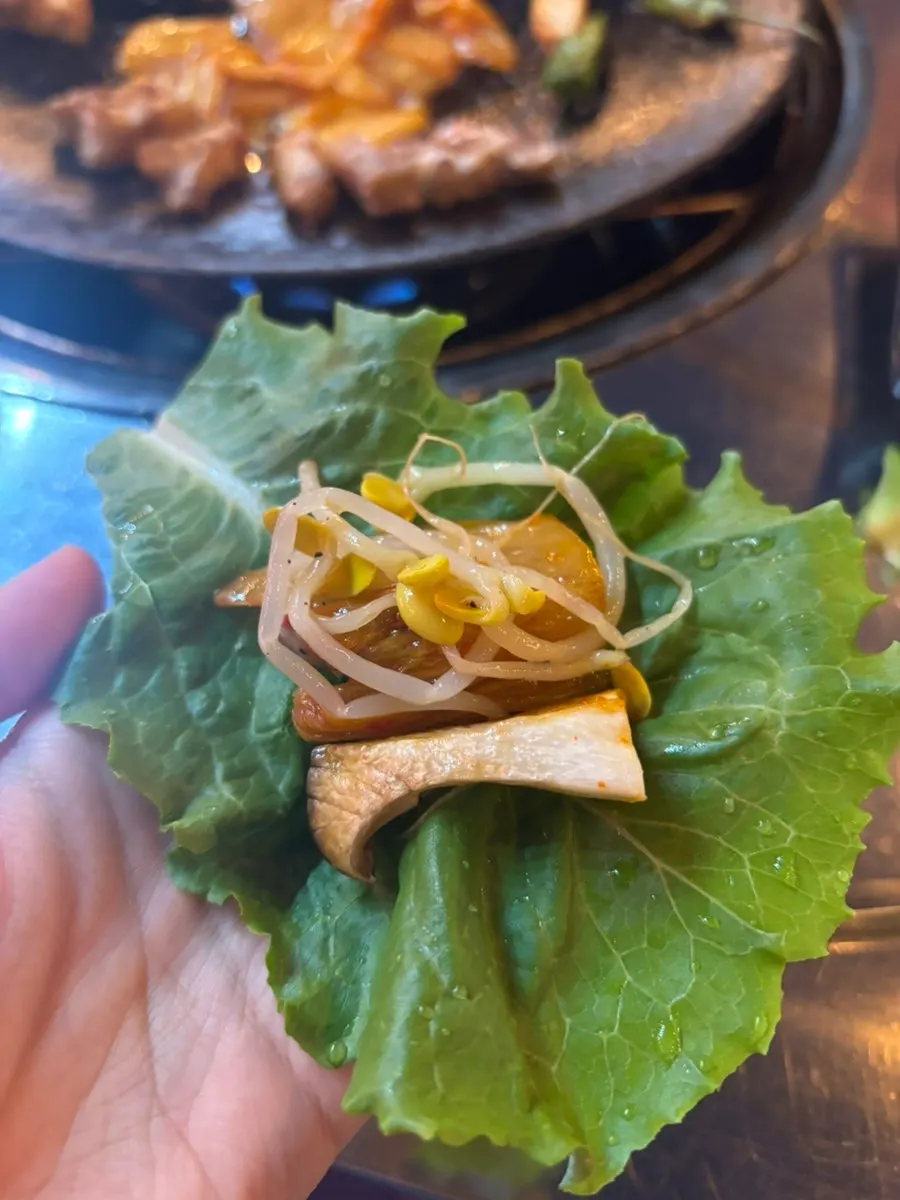 Pre-seared pork belly served with angelica pickles