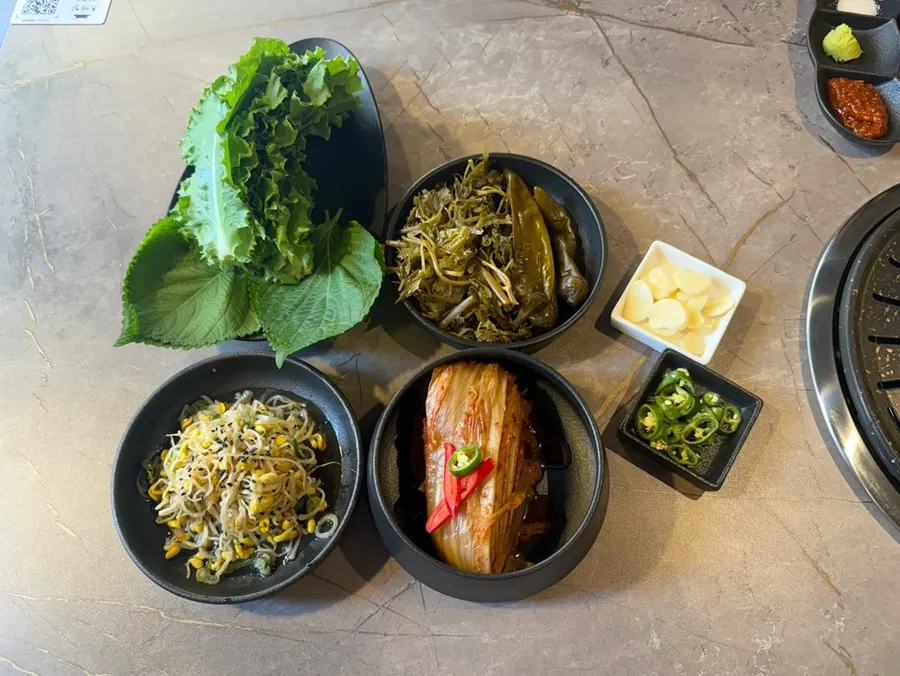 Grilled bone samgyeopsal served on a plate