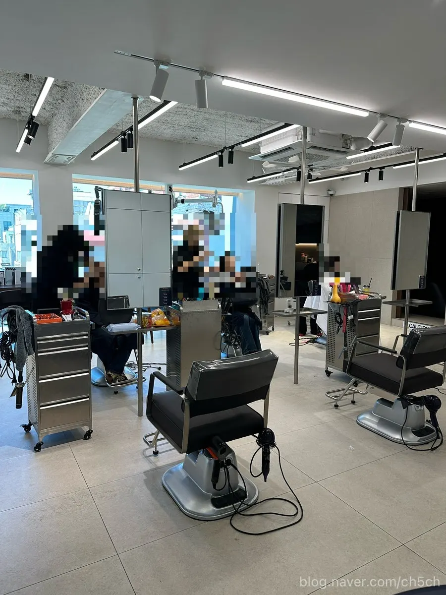 Interior of Biorn Hair with full-height windows