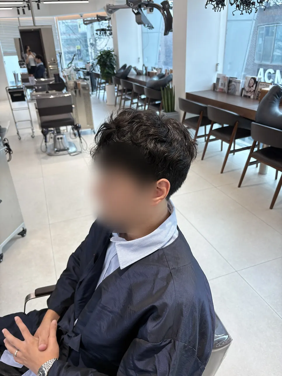 Styling the curl with a blow-dry