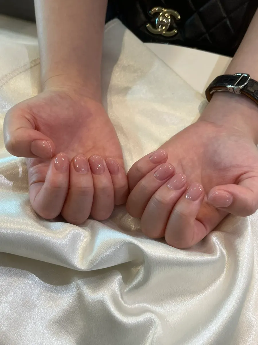 Close-up of nails showing subtle syrup texture