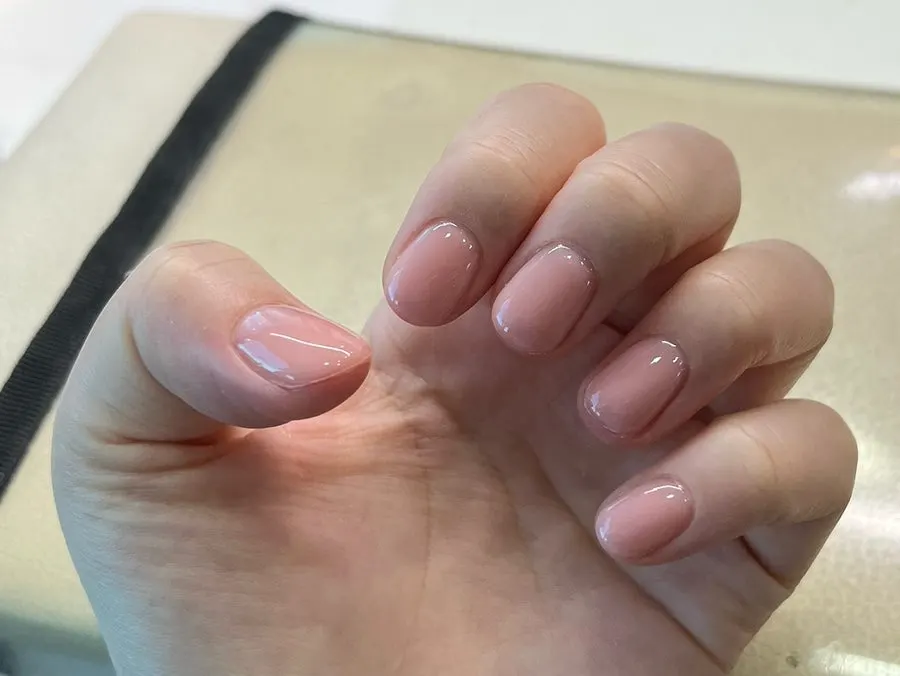 Finished nails with nude syrup color applied