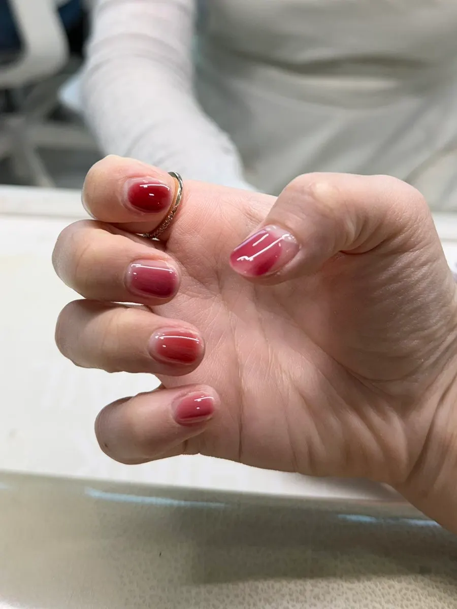 Nails with a thin layer of base coat applied