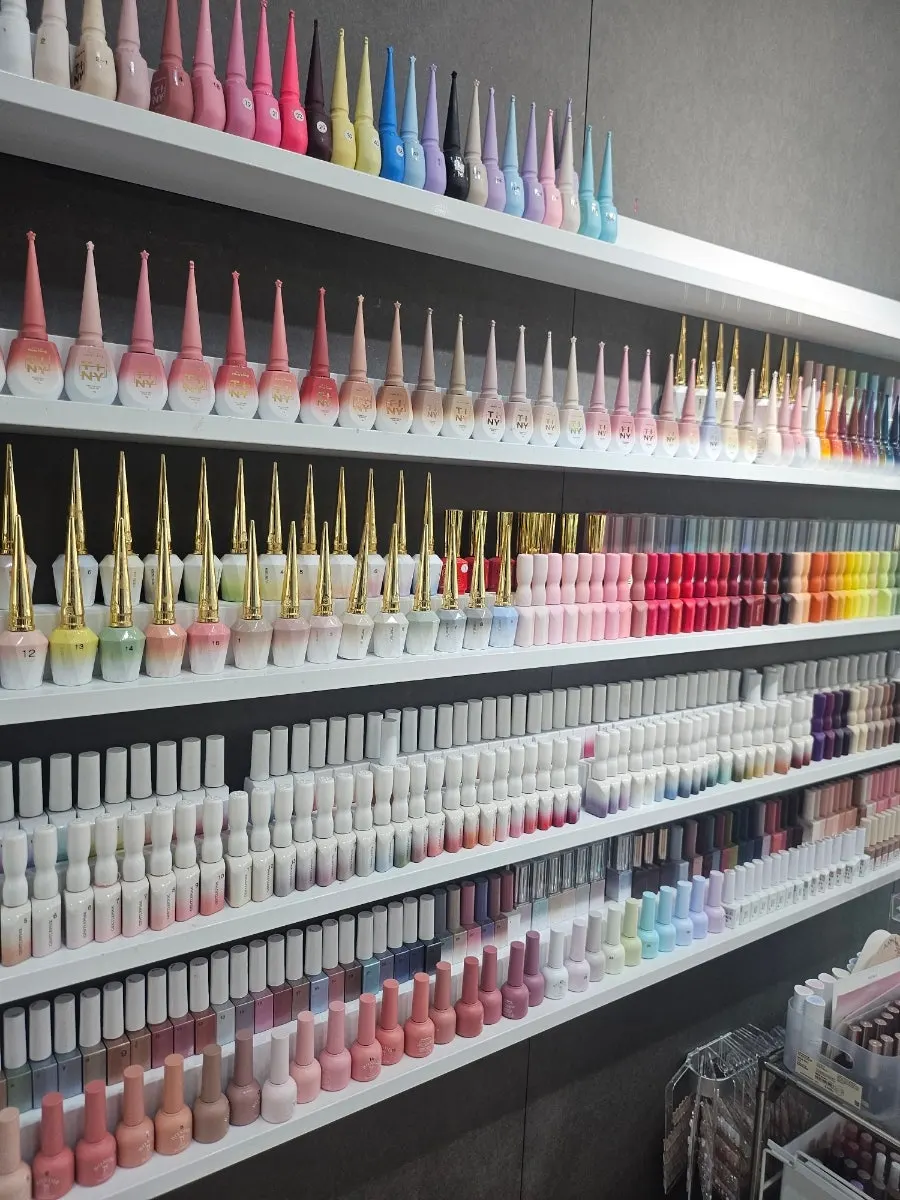 Wall display of various gel nail colors