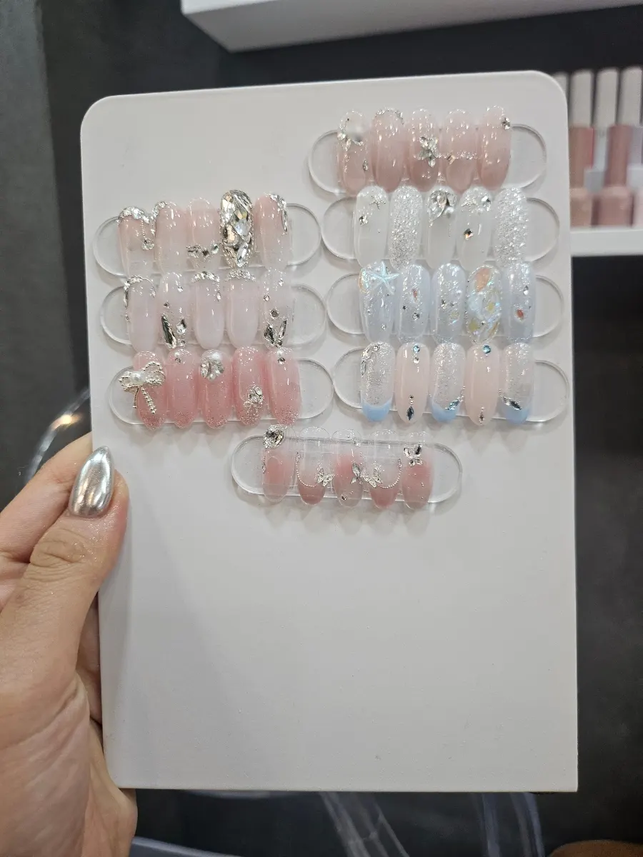 August nail of the month pastel-toned art samples
