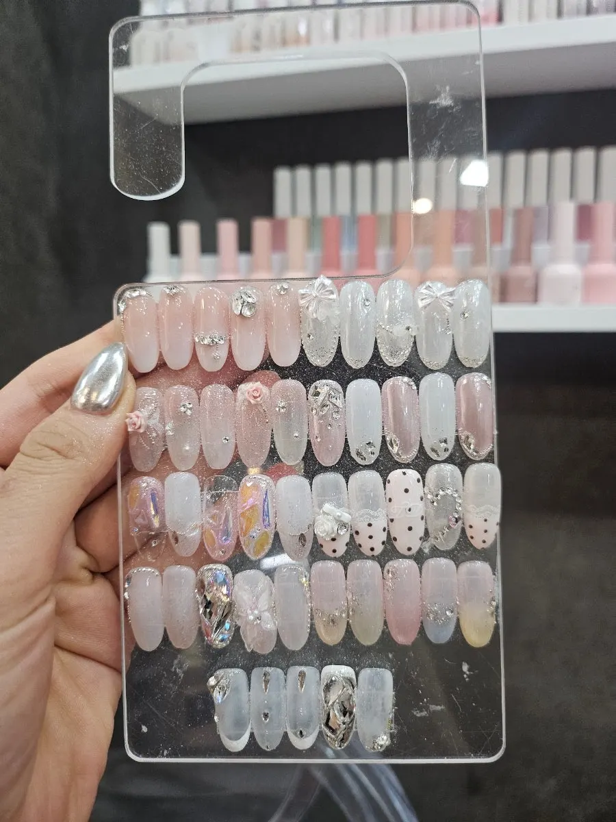 Previous season's nail of the month sample tips