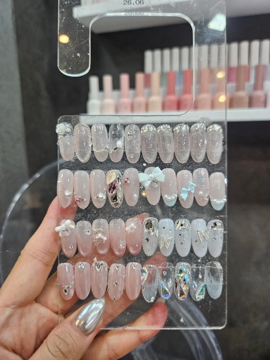 Pink-toned wedding-style nail art sample