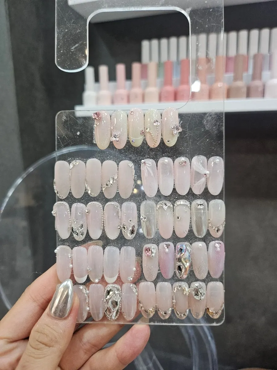 Nail sample with gem and part accents