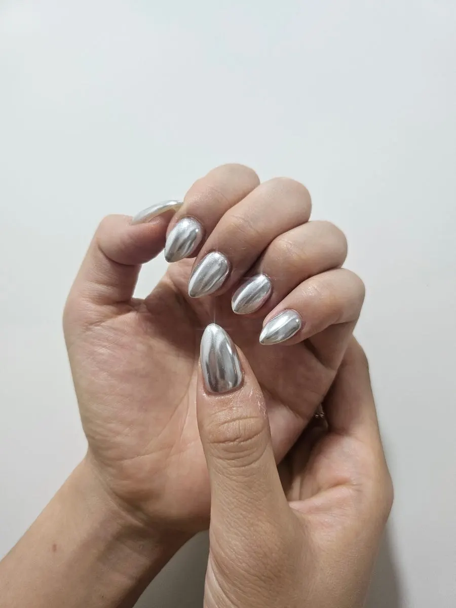 Metal silver nails reflecting under the light
