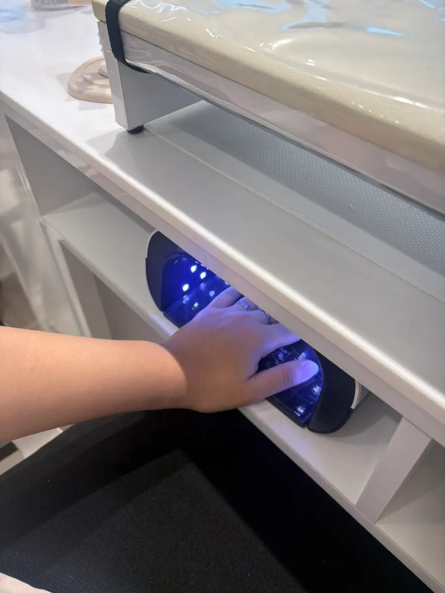 Nail treatment being applied