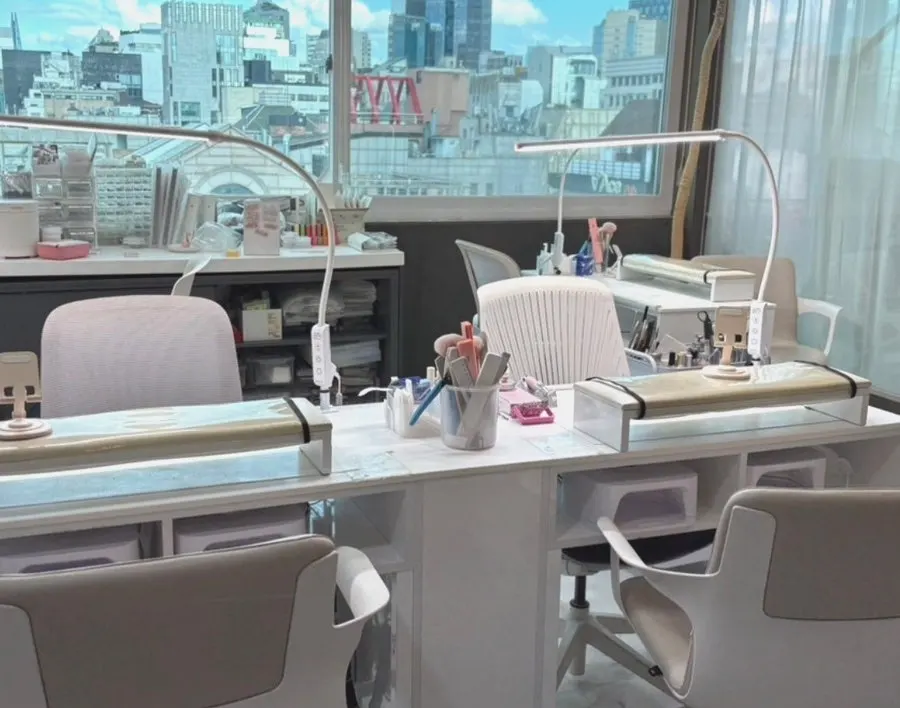 Nail treatment seat at Naeil Didi with a full window view