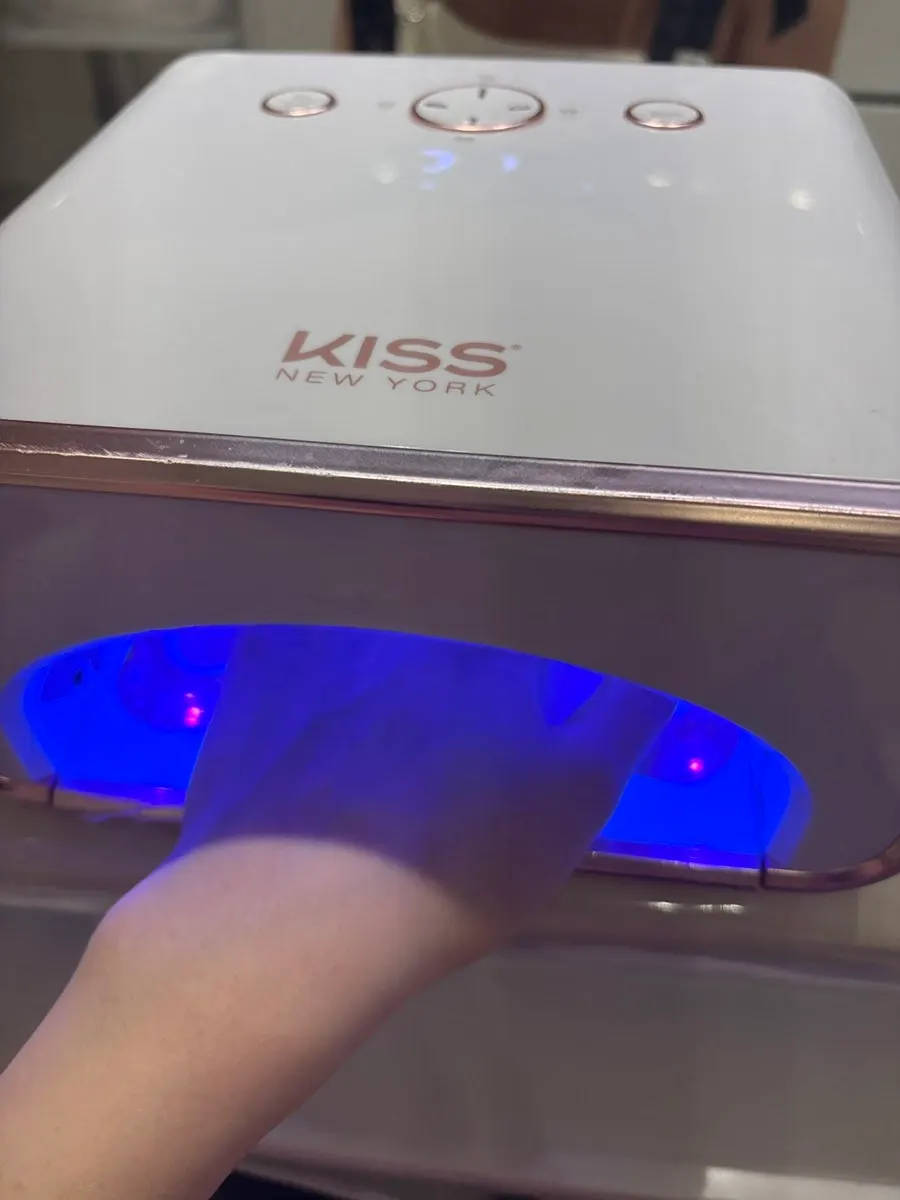 Cuticle care and nail shaping process